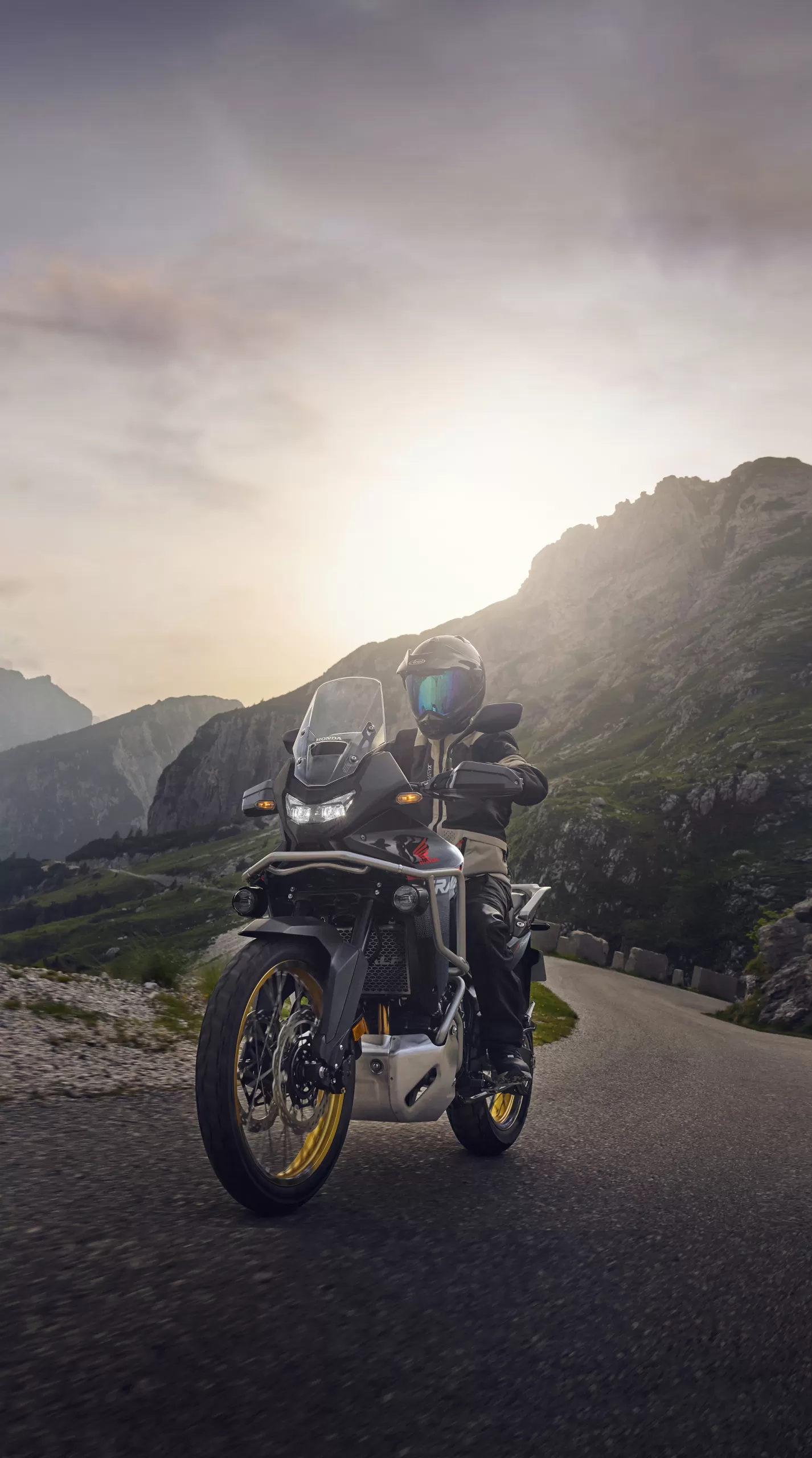 Honda XL750 TRANSALP rriding a mountain road
