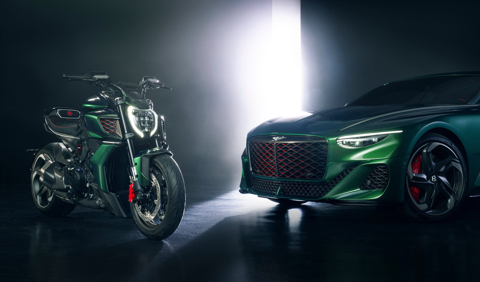 Ducati Diavel for Bentley pictured alongside the Bentley Batur, showing the shared Scarab Green paint and grille design